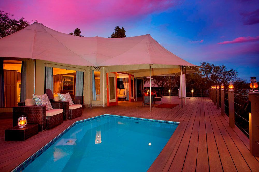Hippo Lakes Luxury African Safari Lodge luxury safari tent on the lake with deck and swimming pool
